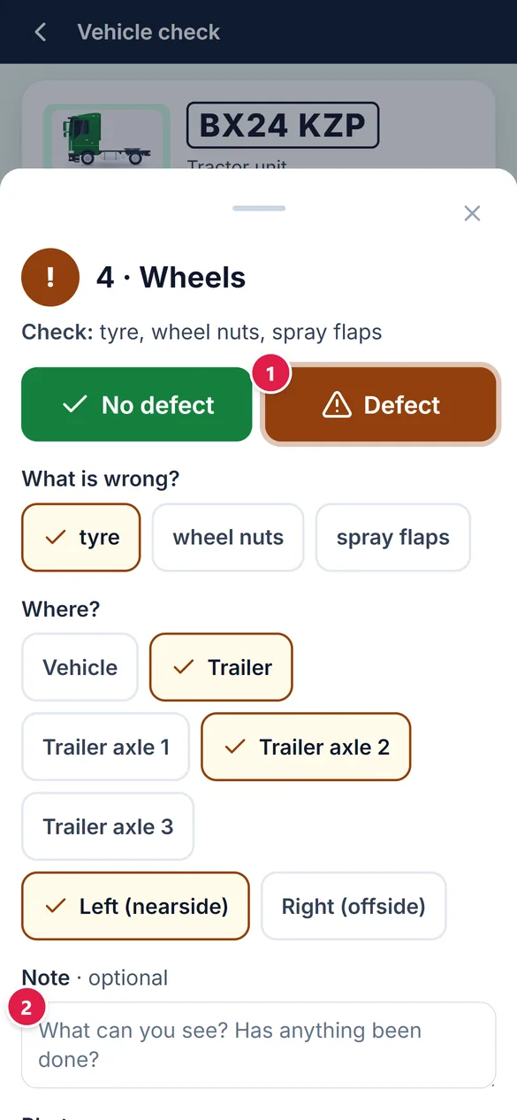 A defect on the wheels zone: what is wrong, which axle and side, and a note.